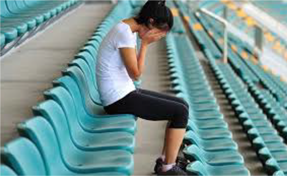  Girl alone in bleachers